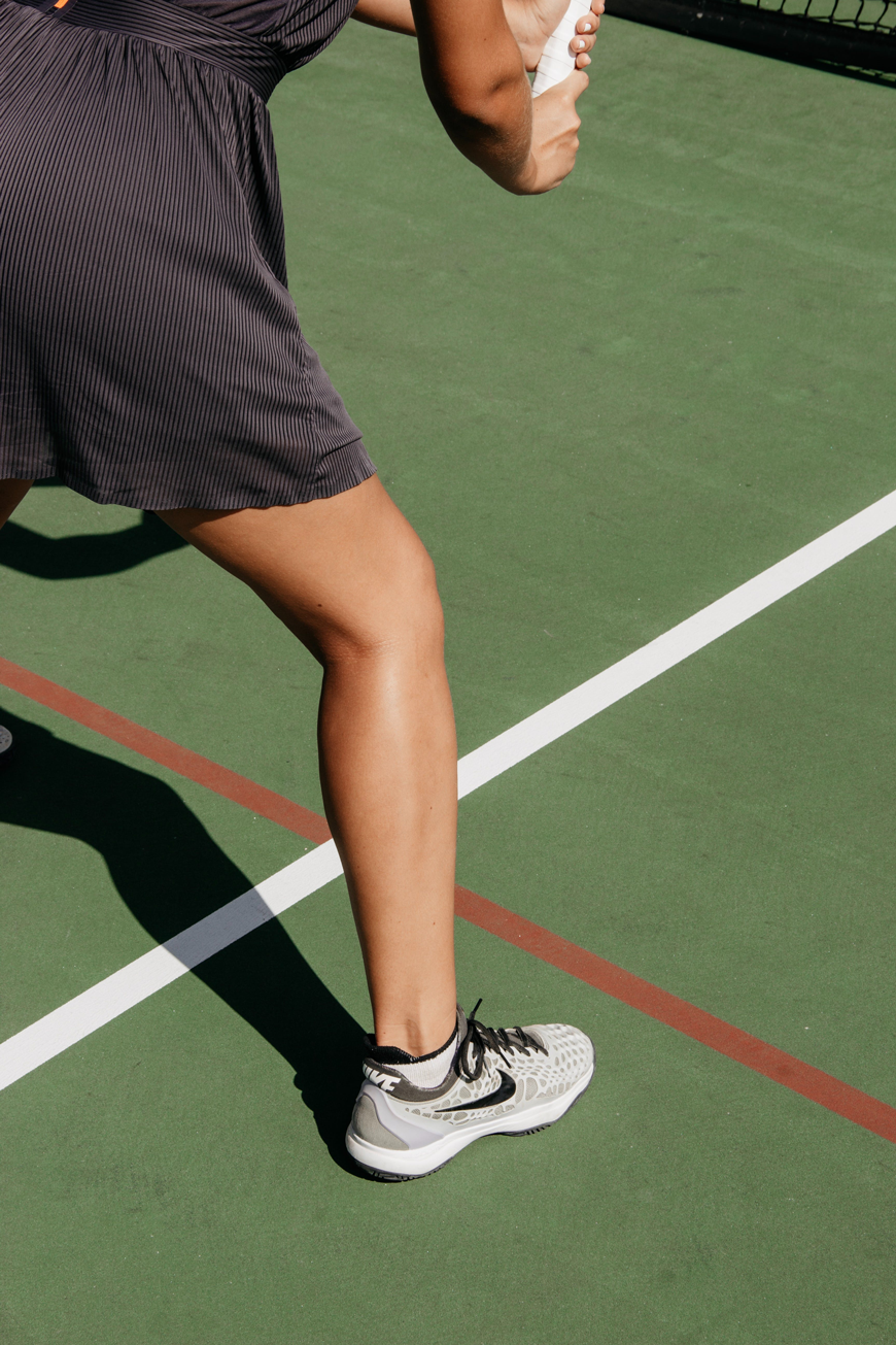Original Passion Sports portfolio cover: a tennis player on court